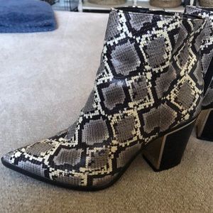 Circus by Sam Edleman snakeprint boots.